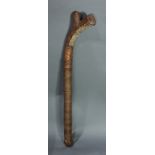 A Fijian rootstalk club, Polynesia, with elaborate and extensive woven wrapping, 33"h; Provenance: