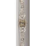 Lady's Hamilton diamond, platinum, 14K white gold wristwatch Dial: Tonneau, silvered, (
