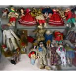 (Lot of approx. 30) Two shelves of assorted dolls, including Indian, Mexican and International,