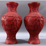 (lot of 2) A pair of cinnabar lacquer vases, the sides incised in continuous garden tableaux of