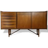 Danish Modern credenza, having a rectangular top, above the six drawer case with two sliding
