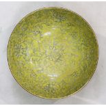 A Chinese yellow-ground bowl, both interior and exterior enamelled with flower and folige patternss,