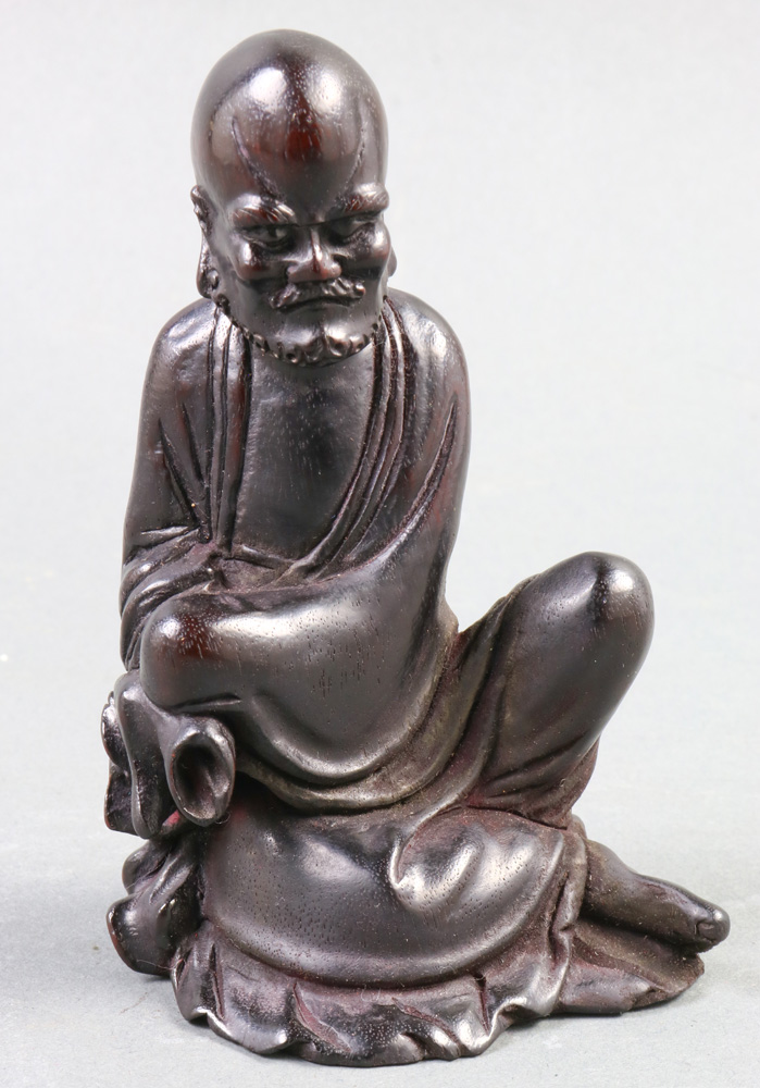 A Chinese hardwood carving of Luohan, size: 4.75"h