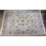 An Indo Tabriz carpet, 7'10" x 10'2"