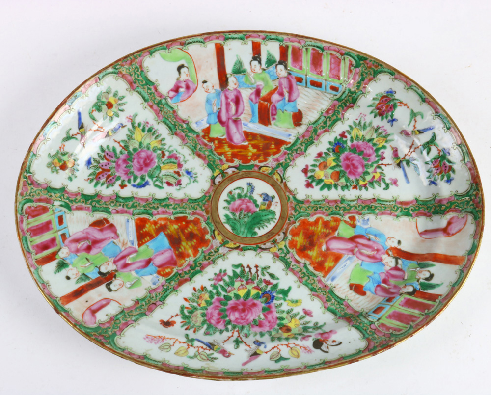 A Chinese Canton famille-rose porcelain charger, of oviod shape and painted with six panels, each