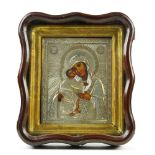 Russian icon, having a silver oklad and depicting the Mother of God, 10"h x 9"w