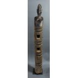 Architectural post with glossy head and torso carved, the torso possibly carved more recently, 54"h;