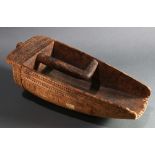 An Oceanic canoe bailer, probably Trobriand Islands, with handle inside the scoop form, extensive