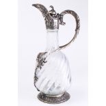 A Continental .800 silver and glass claret jug in the Rococo Taste
