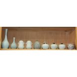 (lot of 9) A group of eight Chinese celadon jars and long neck vases