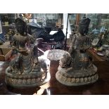 (lot of 2) Two Chinese cast bronze figures of guanyin