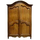 A Louis XV Provincial fruitwood armoire