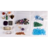 Collection of unmounted stones and jewelry