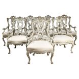 (lot of 8) A set of Manuel Cortez wood and upholstered armchairs
