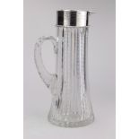 An American sterling mounted brilliant cut glass pitcher