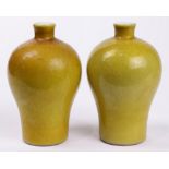(lot of 2) A Pair of Chinese yellow ground glazed vases,