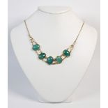 Jadeite and yellow gold necklace