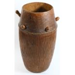 A nicely carved and used wood drum without its skin top