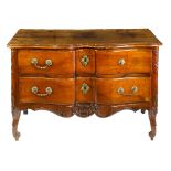 A Louis XV fruitwood commode en arbalete