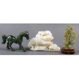 (Lot of 12) A group of twelve Chinese hardstone carvings,