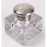 A Gorham inkwell with crystal base and sterling lid