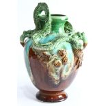 A European majolica dragon urn