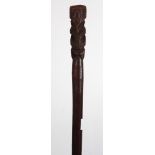 Maori New Zealand tall staff 19th century, with figural finial above the carved body