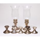 (lot of 7) Sterling weighted candlestands