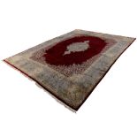 A Persian kerman carpet