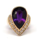 Amethyst, diamond, 14k yellow gold ring Featuring (1) pear-cut amethyst, weighing approximately 9.50