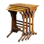 (lot of 4) A group of Emile Galle marquetry decorated nesting tables, the graduated group of four