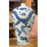 A Chinese blue and white dragon vase, meiping , depicted with dragon chasing flaming ball, base