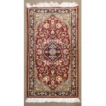 A Persian Hamadan carpet, 3' x 5'