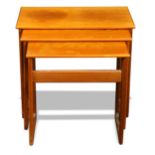 A set of Danish Modern nesting tables, each of rectangular form, and rising on conjoined legs,
