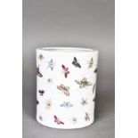 A Chinese famille-rose 'butterfly' porcelain brush pot, with a six-character mark to the base. 10