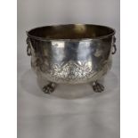 A large Classical style silverplate wine cooler, likely 19th century, of ovoid form having figural