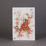 A Chinese porcelain plaque, with a figural painting of a longevity Buddha seated in front of a