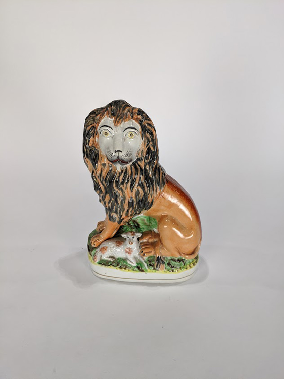 English Staffordshire figure of a lion and a lamb, the lion having a molded and painted body, 10.5" - Image 2 of 4