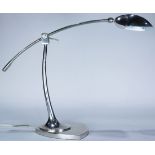 A Machine Age adjustable desk lamp having a silvered finish, overall 20"h Provenance: Property