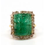 Emerald, diamond, 18k yellow gold ring Centering (1) carved rectangular emerald cabochon,