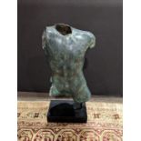 A patinated figural sculpture of a male torso, rising on custom base, overall: 25"h