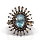 Aquamarine, diamond, blackened silver, 18k yellow gold ring Centering (1) oval-cut aquamarine,