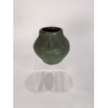 An early Arts and Crafts Van Briggle art pottery vase, the ovoid form with a heavy green glaze and
