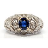 Sapphire, diamond, 18k white gold ring Featuring (1) oval-cut sapphire, weighing approximately 1.
