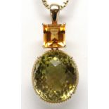 Citrine, quartz, 14k yellow gold pendant Featuring (1) faceted top oval-cut green quartz,