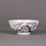 A Chinese porcelain bowl, with plum flower motif painting on the exterior, four-character mark to