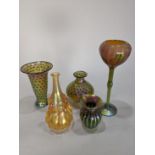(lot of 5) Lundberg Studios group, consisting of a floral form vessel executed in rose to green, one