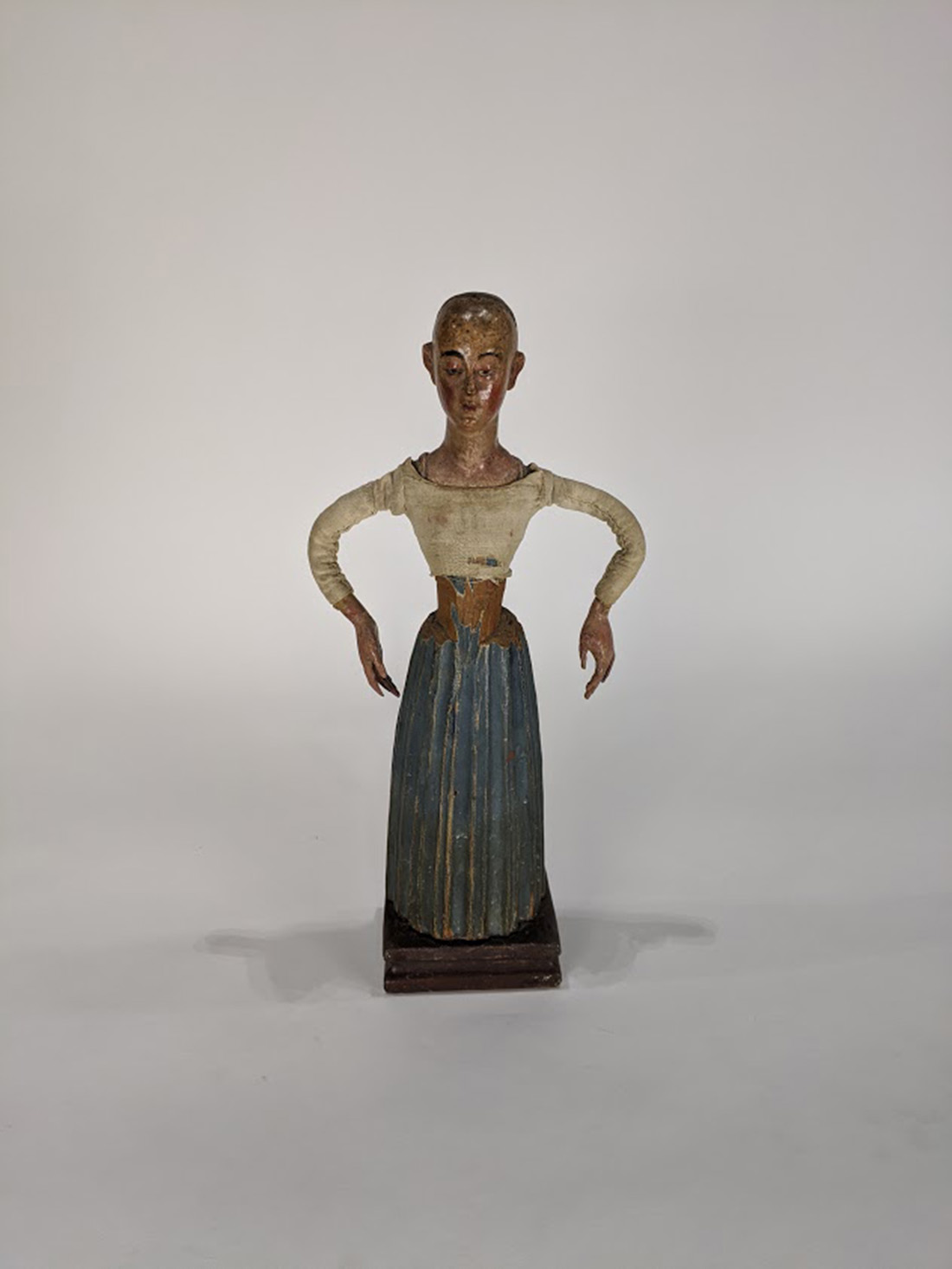 Continental Santos figure with polychrome decorated body, 18th century, 15"h