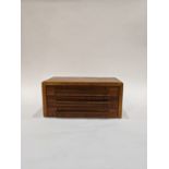 A Hawaiian Koa wood jewelry box, the highly figured box with three drawers each felt lined, the