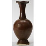 Chinese Yaozhou-style Persimmon Glazed Foliate Rim Vase Of ovoid body supported on a tall splayed